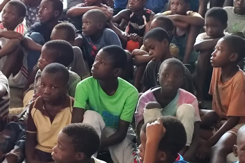 Children gathered together at a mission meeting